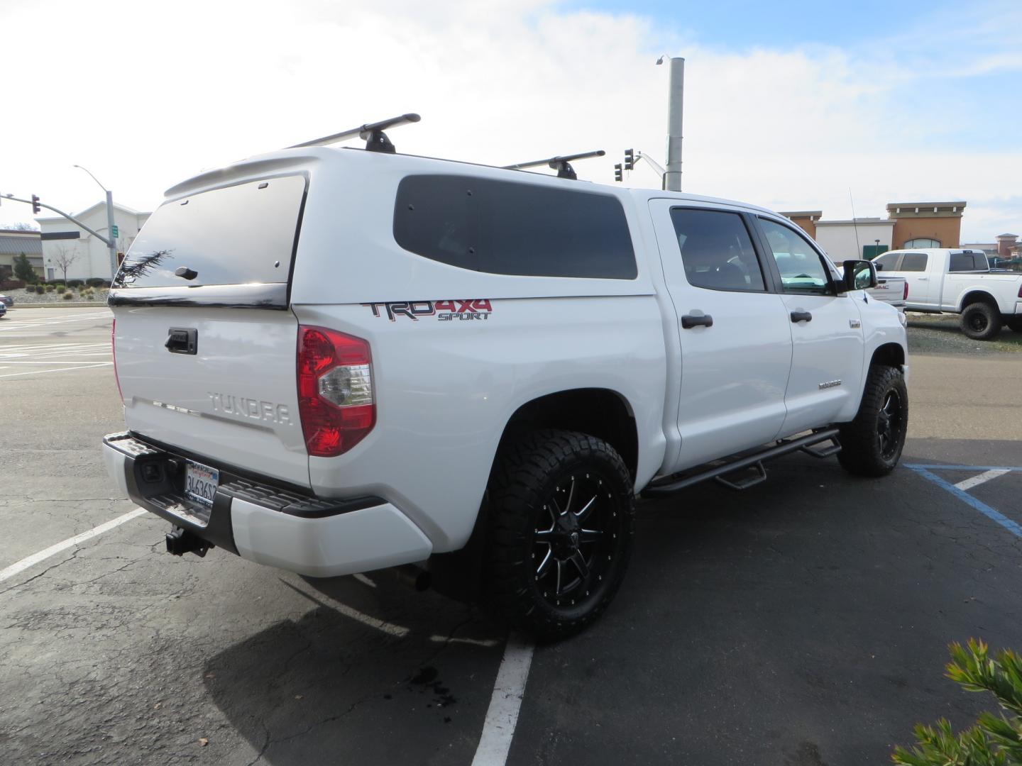 2019 White /BLACK Toyota Tundra SR5 5.7L V8 CrewMax 4WD (5TFDY5F19KX) with an 5.7L V8 DOHC 32V engine, 6A transmission, located at 2630 Grass Valley Highway, Auburn, CA, 95603, (530) 508-5100, 38.937893, -121.095482 - Clean leveled Tundra with 20" Fuel Maverick wheels, Nitto Ridge Grappler tires, N-Fab running boards, Snug Top camper shell with Yakima racks. - Photo#4